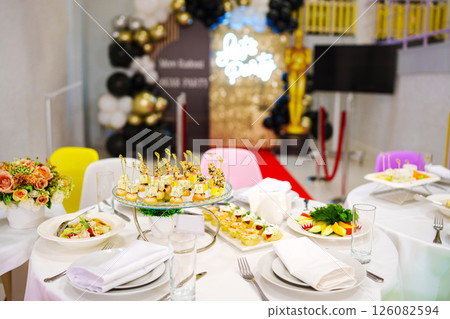 table served Assorted canapes for the festive table. Catering services. table served Assorted canapes for the festive table. Catering services. 126082594