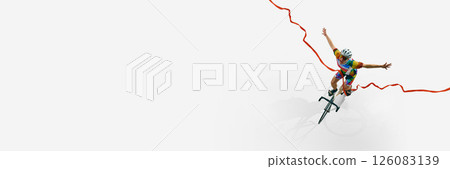 Aerial view of male cyclist in full gear, riding bicycle and raising hands upwards in winning pose isolated on white background. Victory. 126083139