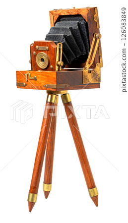 Vintage wooden folding camera on tripod capturing memories 126083849