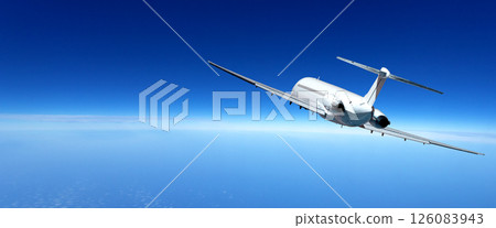 White jet airplane flying high in the blue sky 126083943