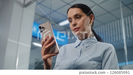 Airport Terminal: Businesswoman Scanning Boarding Pass Using Smartphone 126085091