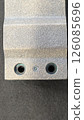 Holes in metal parts 126085696