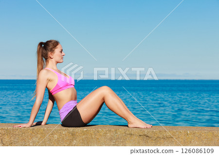 Young woman exercising outside 126086109