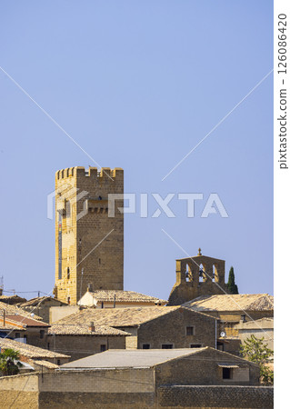 Layana Tower rising above the rooftops in Aragon, Spain 126086420