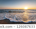 Sunrise at the beach. 126087633