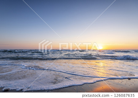 Sunrise at the beach. 126087635