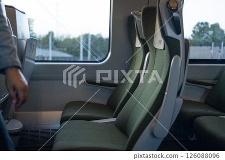 Empty train seats with passenger entering, Gdansk 126088096