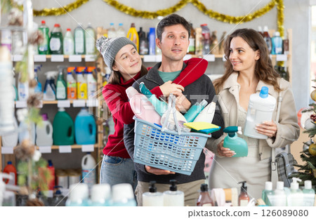 Cheerful family shopping for self-care and hygiene products in decorated store Cheerful family shopping for self-care and hygiene products in decorated store 126089080