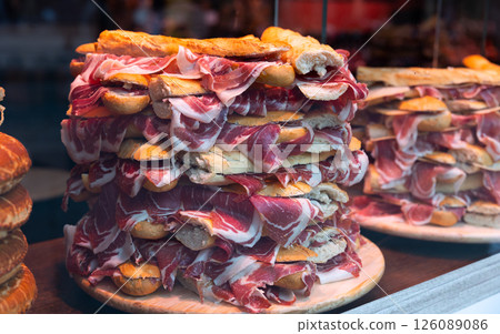 Sandwiches with Spanish ham on bar window in Madrid Sandwiches with Spanish ham on bar window in Madrid 126089086
