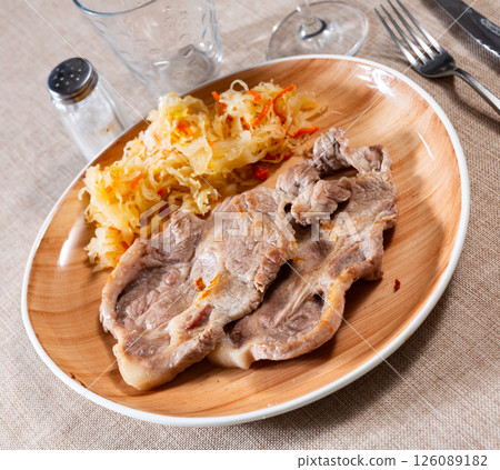 Delicious pork steak with sauerkraut, served on platter 126089182