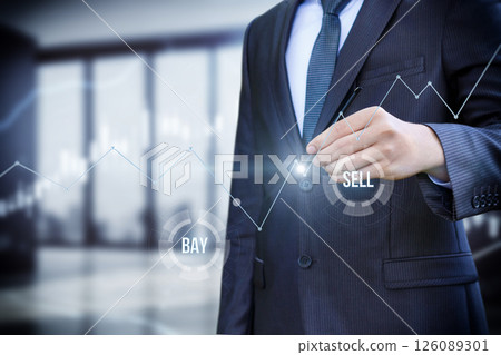 Trader analyzing market trends Trader analyzing market trends 126089301