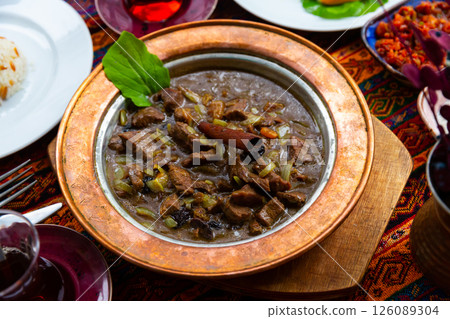Turkish mutancana from lamb stewed with dried fruits Turkish mutancana from lamb stewed with dried fruits 126089304
