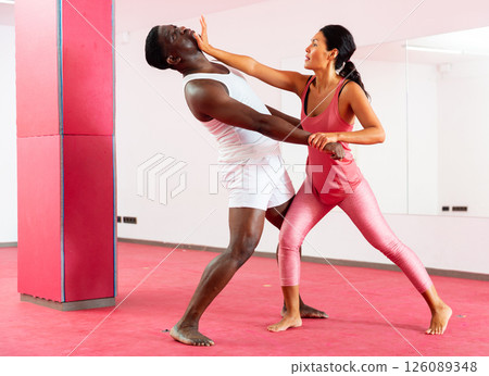 Asian woman training captures on self-defense course 126089348