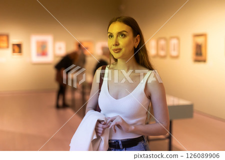Girl view pictures and icons in museum hall Girl view pictures and icons in museum hall 126089906