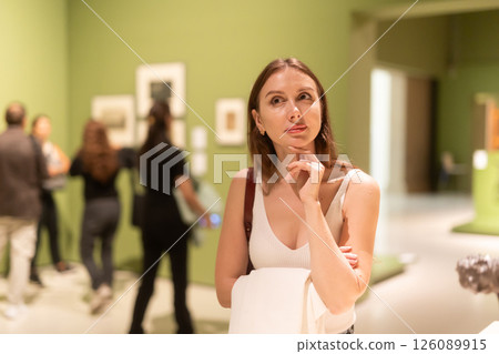 Girl view sculpture in museum hall 126089915