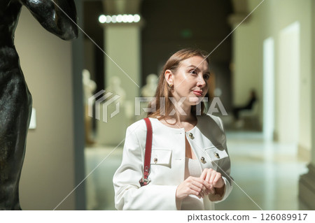 Girl view sculpture in museum hall 126089917