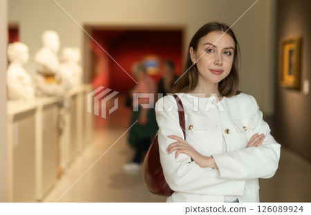 Thoughtful young woman in a sculpture museum 126089924