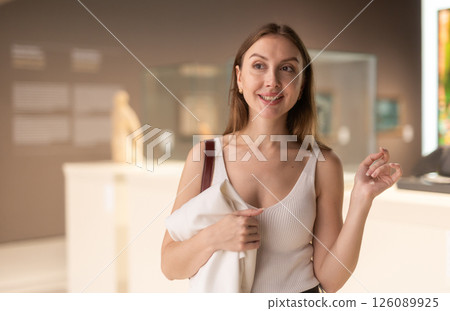 Girl view pictures and icons in museum hall Girl view pictures and icons in museum hall 126089925
