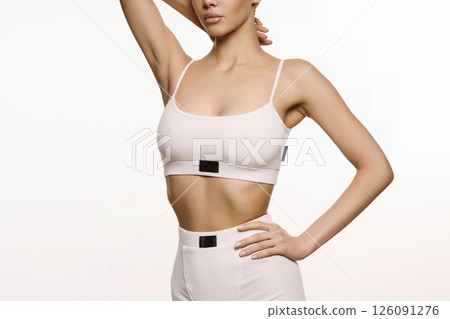 beautiful body young woman in sport shorts and top beautiful body young woman in sport shorts and top 126091276