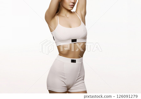 beautiful body young woman in sport shorts and top. fitness girl 126091279