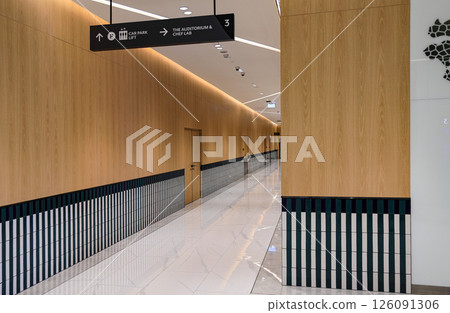 The beautiful and modern corridor or hallway of modern building. Mystical interior of empty corridor. The beautiful and modern corridor or hallway of modern building. Mystical interior of empty corridor. 126091306