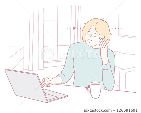 A Stressed Individual Struggling While Working on a Laptop at Home in a Challenging Environment 126091691