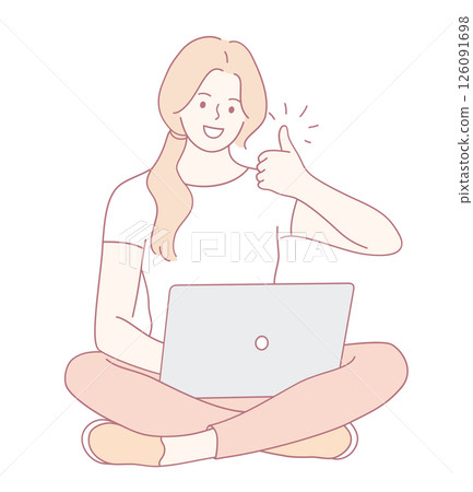 A joyful woman works on her laptop with a thumbs up, showing a positive, focused approach A joyful woman works on her laptop with a thumbs up, showing a positive, focused approach 126091698