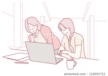 Two women are collaborating effectively while working over a laptop in a modern workspace setting 126091722