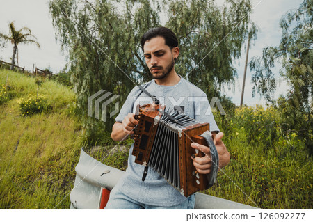 Man WIth Talent Playing Accordion In South Italy  126092277