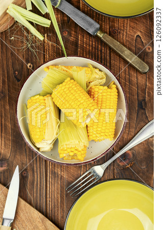Delicious juicy sweet boiled corn. Delicious juicy sweet boiled corn. 126092337