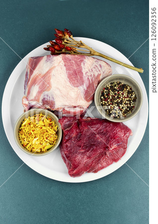 Pieces of raw meat for cooking. Pieces of raw meat for cooking. 126092356