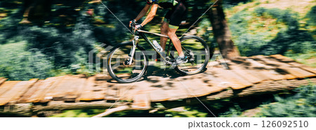 Mountain Bike cyclist riding track at sunny day, healthy lifestyle active athlete doing sport 126092510