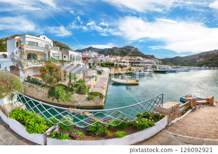 Unbelivable view of Poltu Quatu port and bay with luxury yachts on Costa Smeralda. Unbelivable view of Poltu Quatu port and bay with luxury yachts on Costa Smeralda. 126092921
