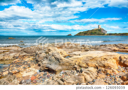 Fabulous view on Ancient Spanish tower of Coltellazzo of Saint Efisio lighthouse at Nora archeological site 126093039