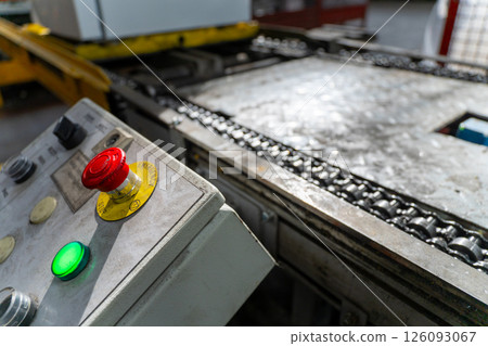 Emergency Stop installed at line conveyor in refrigerator manufacturing plant. 126093067