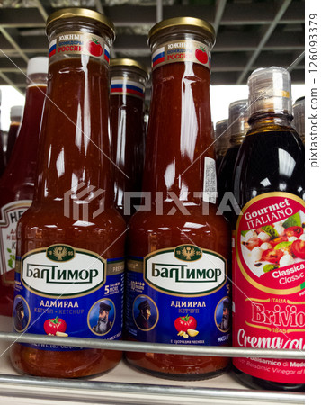 Unique assortment of condiments featuring diverse cultural flavors on display Unique assortment of condiments featuring diverse cultural flavors on display 126093379