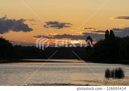 beautiful sunset over the river beautiful sunset over the river 126093414