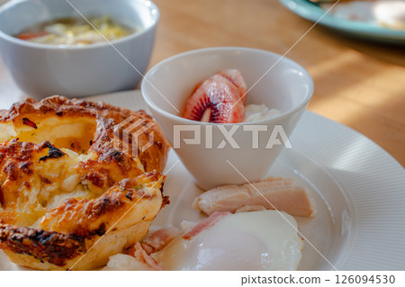 Western-style breakfast plate with morning sunlight streaming in Western-style breakfast plate with morning sunlight streaming in 126094530