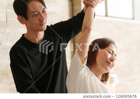 Relaxation staff and senior female customer 126095676