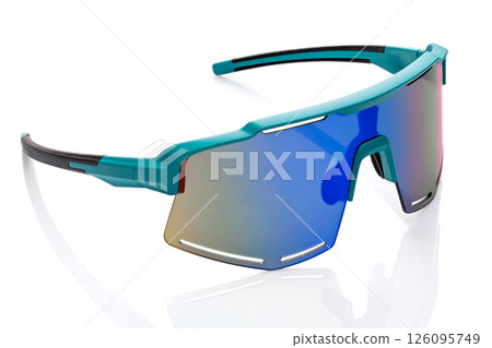 Modern stylish green sports eyewear designed for outdoor activities and protection. Modern stylish green sports eyewear designed for outdoor activities and protection. 126095749