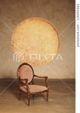 An Elegant Vintage Chair and Round Table Set in a Cozy and Inviting Home Environment 126095882