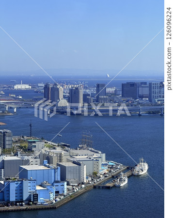Sky view of Shinbashi, one of the business centers of Tokyo, Japan. You can see Odaiba and Tokyo Bay. Sky view of Shinbashi, one of the business centers of Tokyo, Japan. You can see Odaiba and Tokyo Bay. 126096224