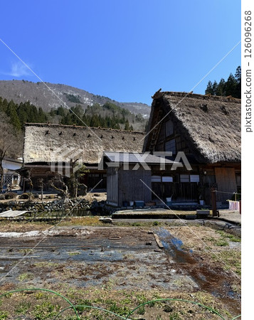 Shirakawa-go is historic village in Gifu Prefecture, famous for its gassho-zukuri farmhouses with steep thatched roofs, a UNESCO World Heritage Site. Shirakawa-go is historic village in Gifu Prefecture, famous for its gassho-zukuri farmhouses with steep thatched roofs, a UNESCO World Heritage Site. 126096268