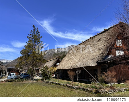 Shirakawa-go is historic village in Gifu Prefecture, famous for its gassho-zukuri farmhouses with steep thatched roofs, a UNESCO World Heritage Site. Shirakawa-go is historic village in Gifu Prefecture, famous for its gassho-zukuri farmhouses with steep thatched roofs, a UNESCO World Heritage Site. 126096273