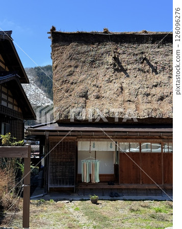 Shirakawa-go is historic village in Gifu Prefecture, famous for its gassho-zukuri farmhouses with steep thatched roofs, a UNESCO World Heritage Site. Shirakawa-go is historic village in Gifu Prefecture, famous for its gassho-zukuri farmhouses with steep thatched roofs, a UNESCO World Heritage Site. 126096276
