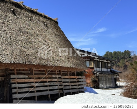 Shirakawa-go is historic village in Gifu Prefecture, famous for its gassho-zukuri farmhouses with steep thatched roofs, a UNESCO World Heritage Site. Shirakawa-go is historic village in Gifu Prefecture, famous for its gassho-zukuri farmhouses with steep thatched roofs, a UNESCO World Heritage Site. 126096285