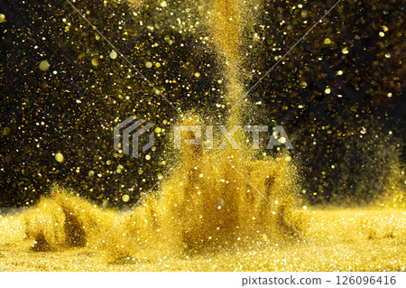 Photo of golden glitter powder sand creating abstract bokeh festive atmosphere. Bokeh of particle element of gold glitter sand light up luxury  background, sparkle glow wallpaper 126096416