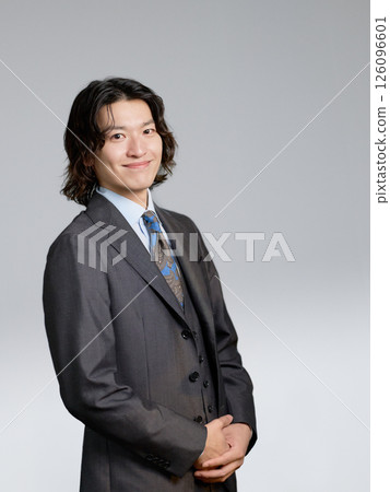 Smiling young businessman 126096601