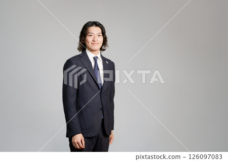 Smiling young businessman 126097083