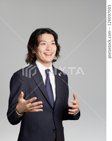 Smiling young businessman 126097085